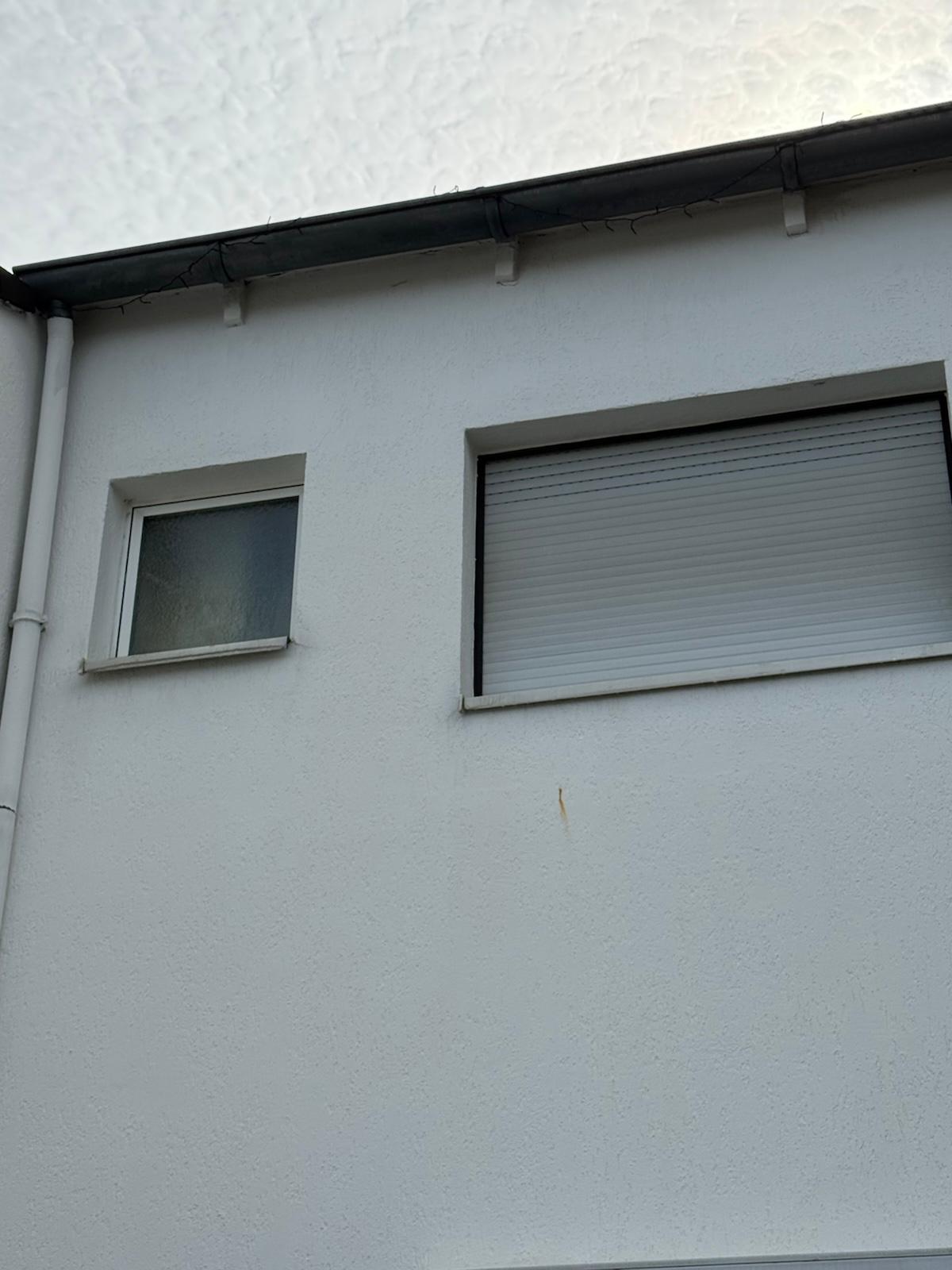 Nachher: Fassade eines Wohnhauses vor und nach der Restauration